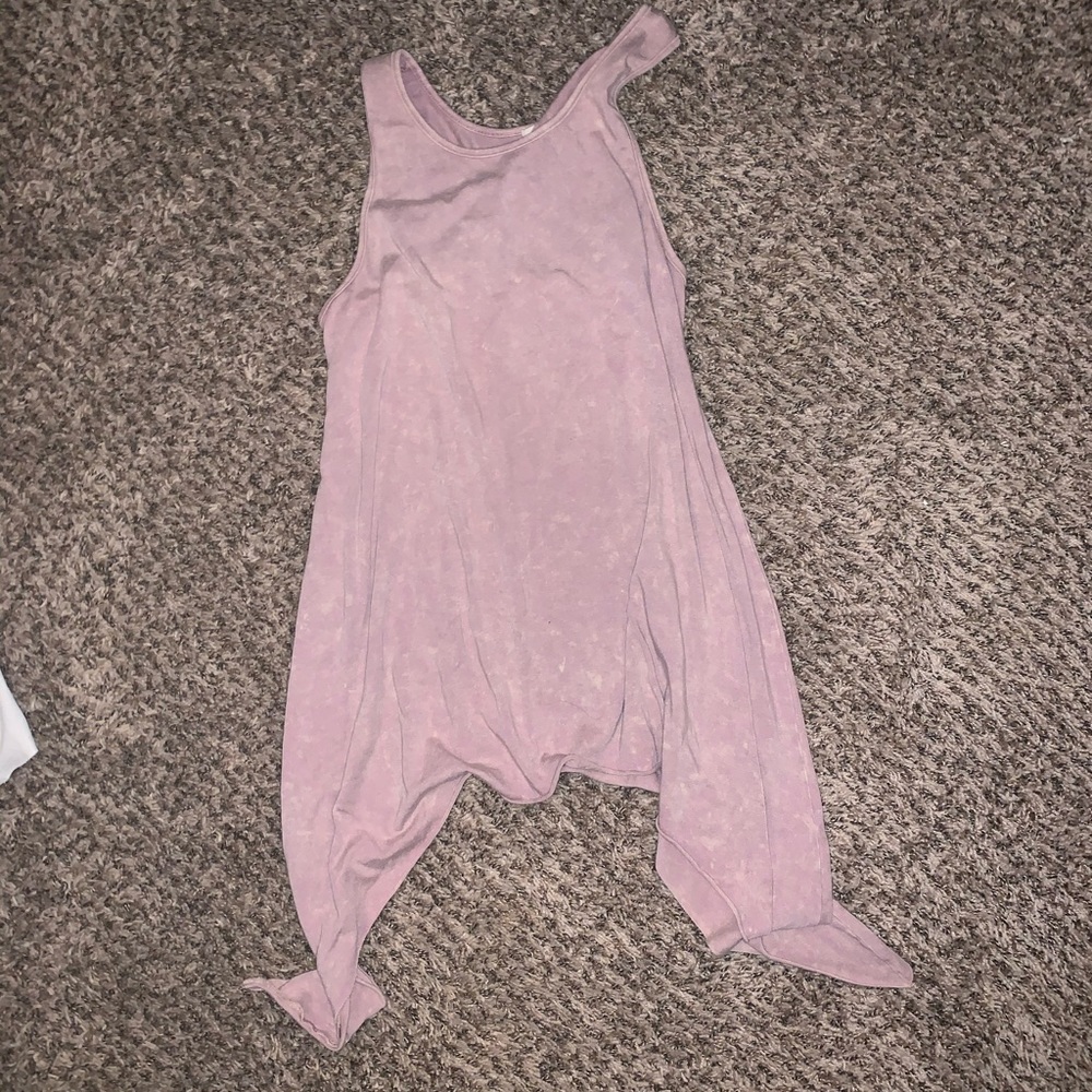 Asymmetrical acid wash tank